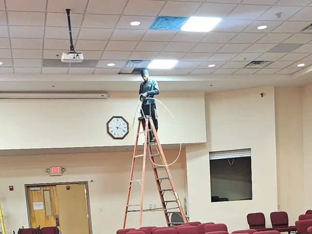 Duct cleaning in a church sanctuary