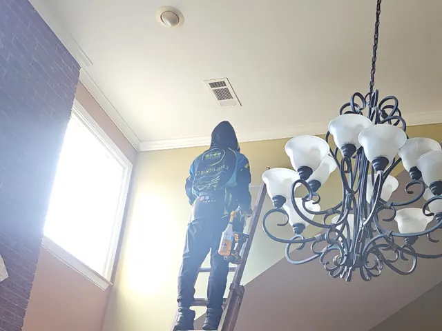 Cleaning high vents in a two-story home