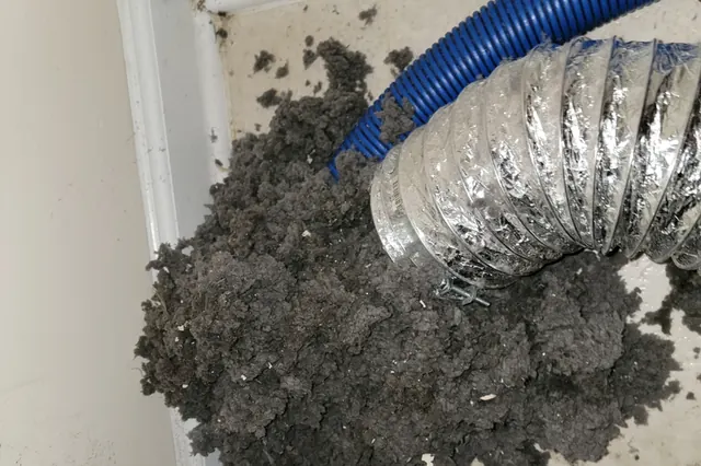 Huge clump of lint pulled out of a dryer vent duct during a Fresh dryer vent cleaning