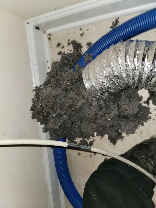 Lint packed inside a dryer vent line