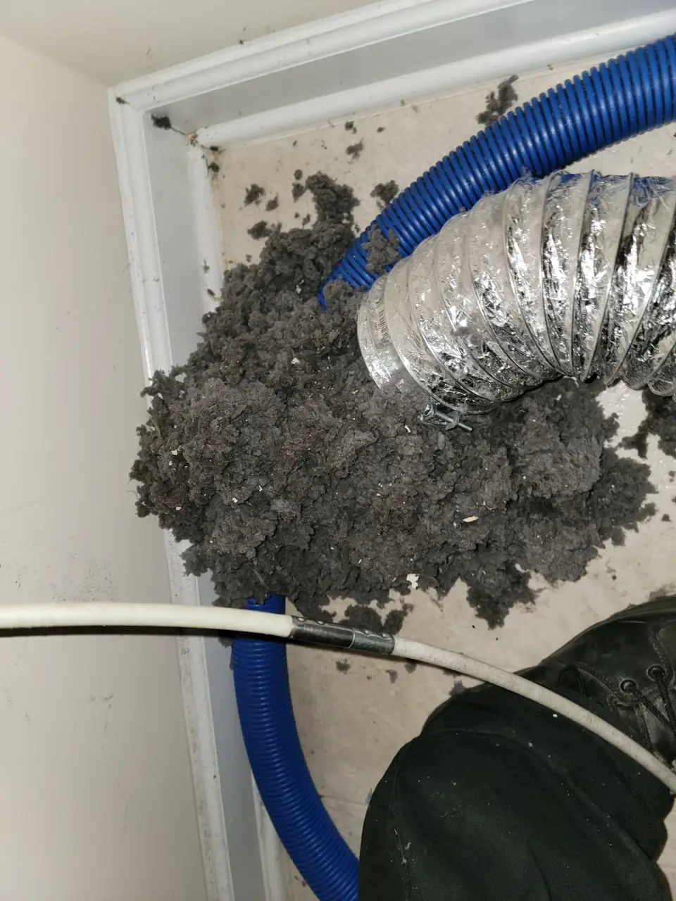 Lint packed inside a dryer vent line