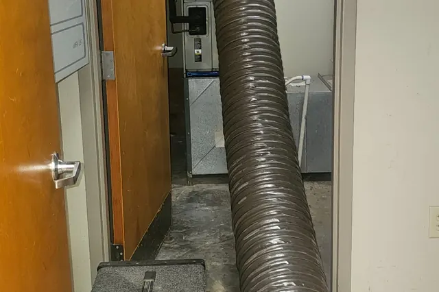 HVAC air handler closet during a Fresh service call