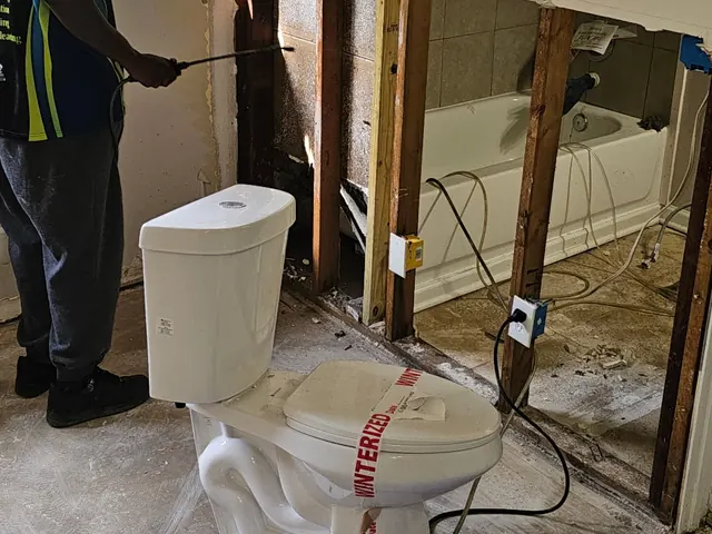 Bathroom walls opened for drying after water damage